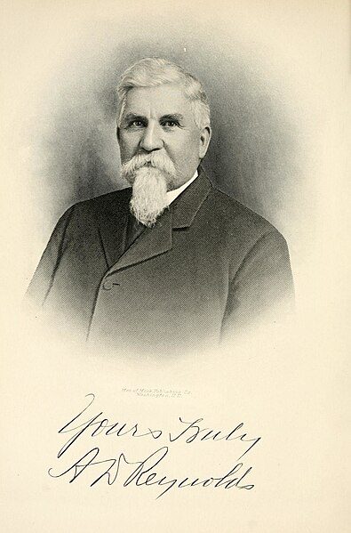 A.D. Reynolds as an older man, sporting a snow-white beard. The photo also includes his signature.